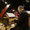 Alexander Weimann playing the harpsichord on stage